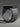 Gray smartwatch band with black metal clasp on a gray background